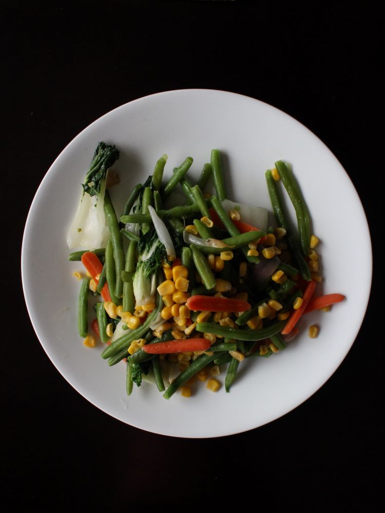 plate of soft cooked vegetables 